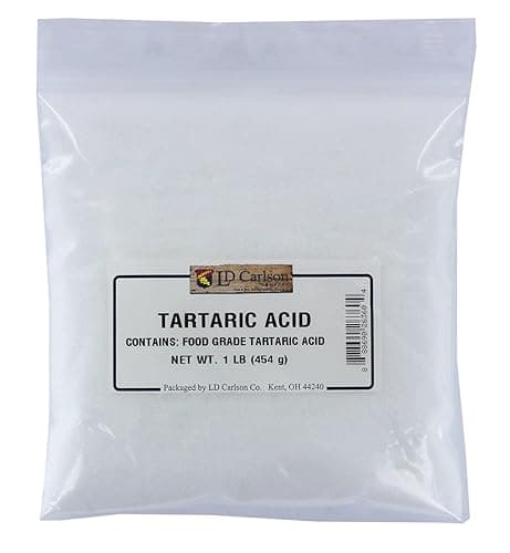 Tartaric acid white crystalline powder used in food processing, beverages, baking, pharmaceuticals, and industrial applications supplied by System Star Industrial in East Africa